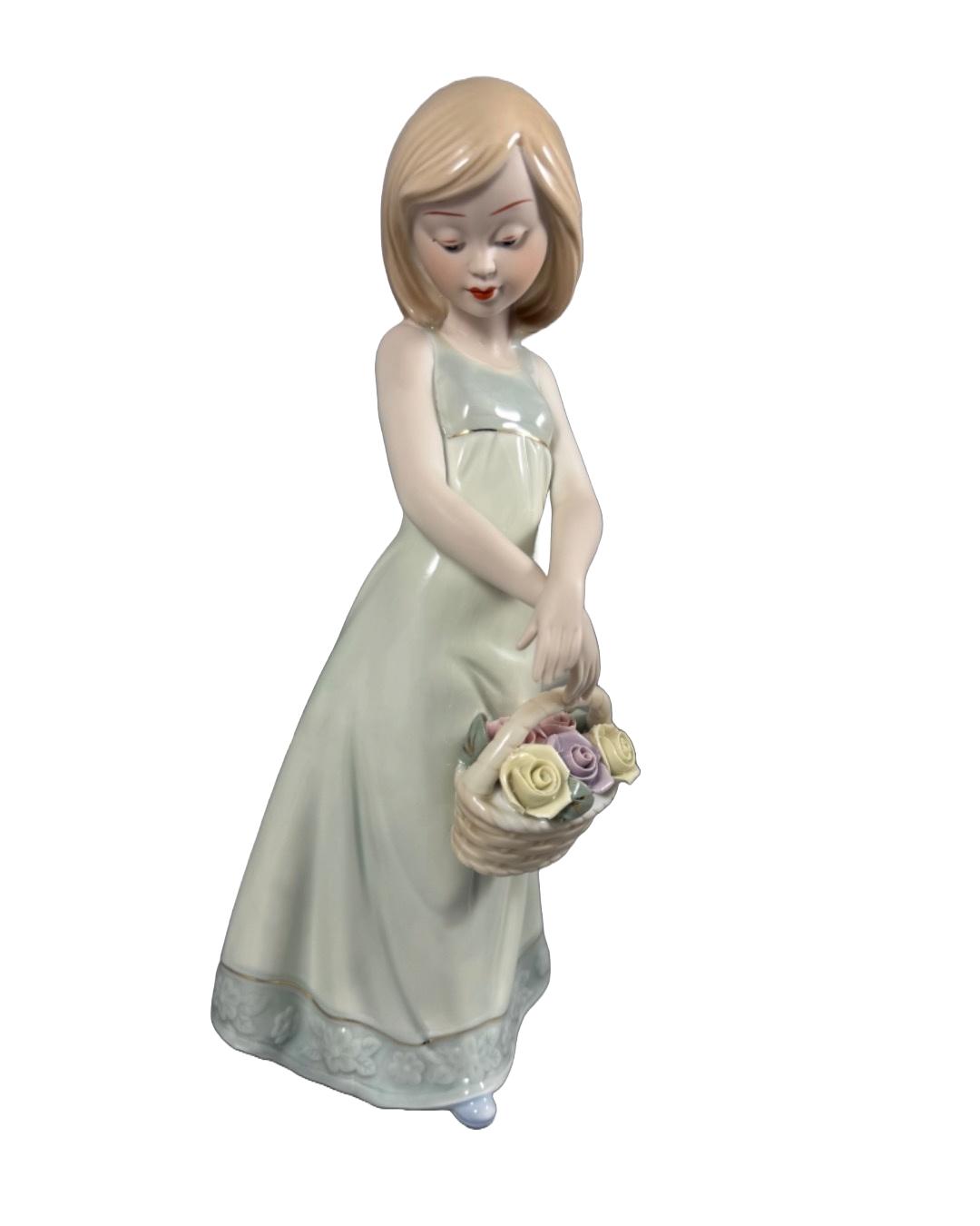 Elegant Porcelain Girl Figurine With Floral Basket